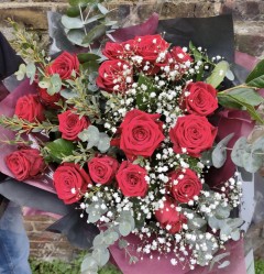 long stemmed red rose hand-tied bouquet